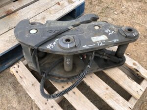 Unused Volvo BAckhoe Hydraulic Quick Couplers.