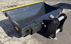 Unused CAT 320 72" Hydraulic Tilting Cleanup Bucket with bolt on cutting edge.
